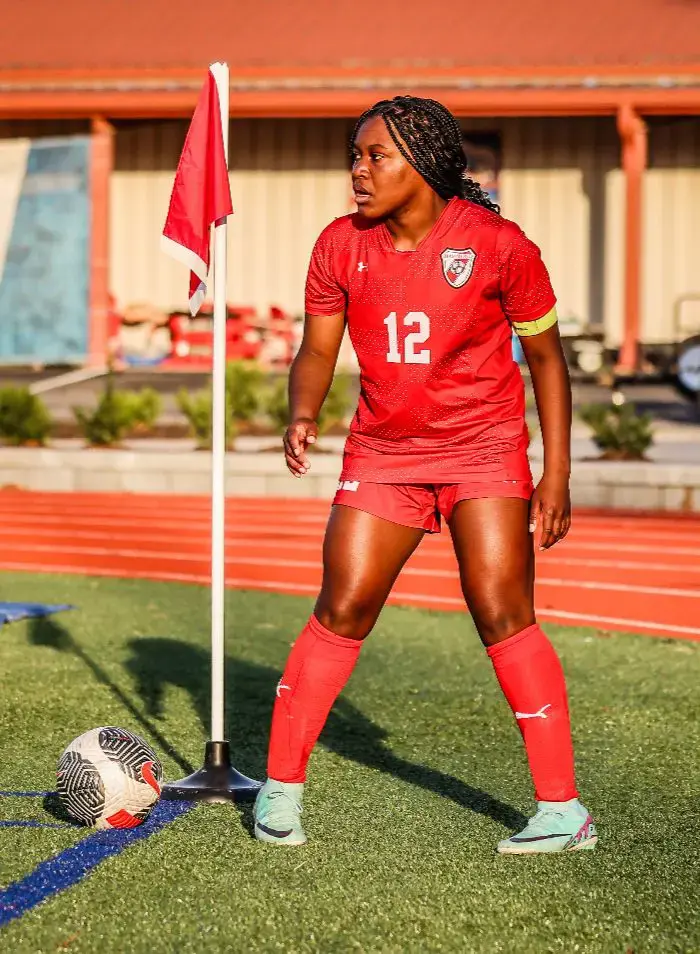Upper school student playing soccer