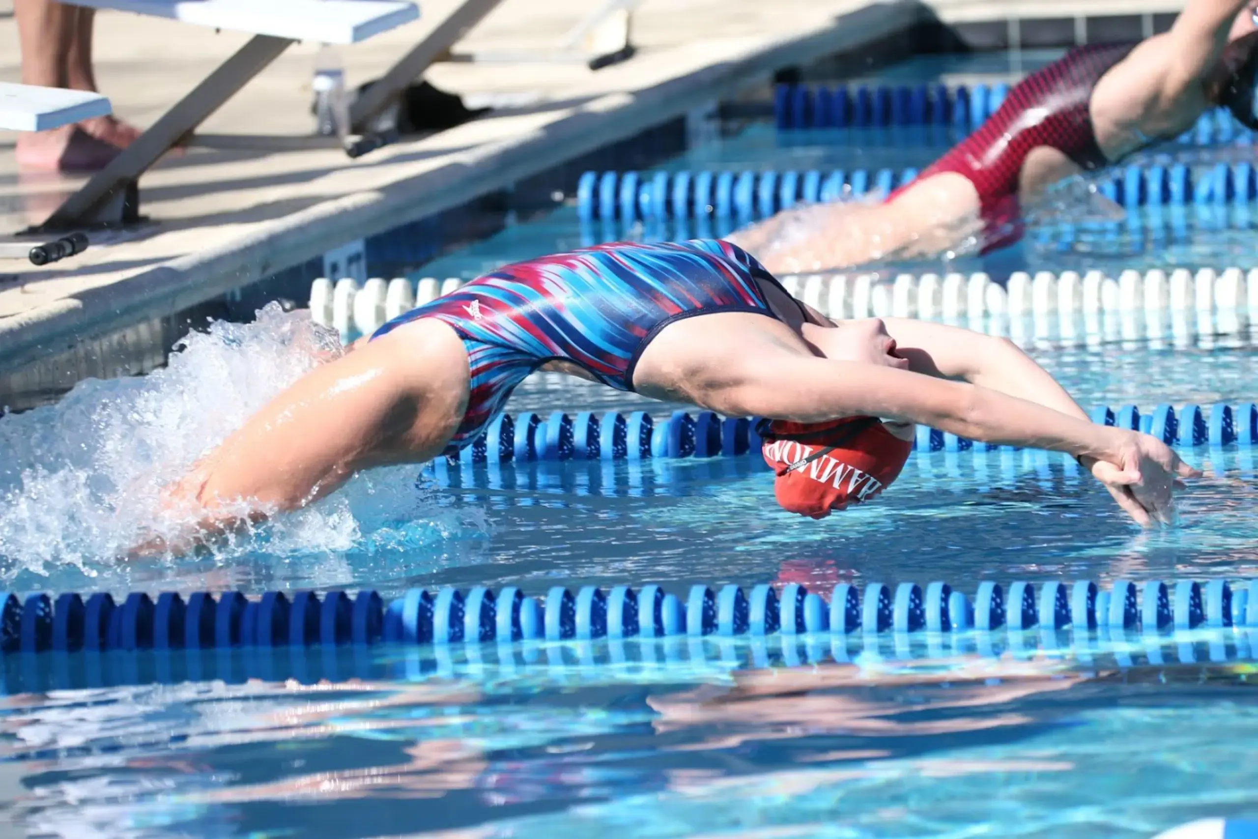 Female Student Perfomring in Swimming Competition