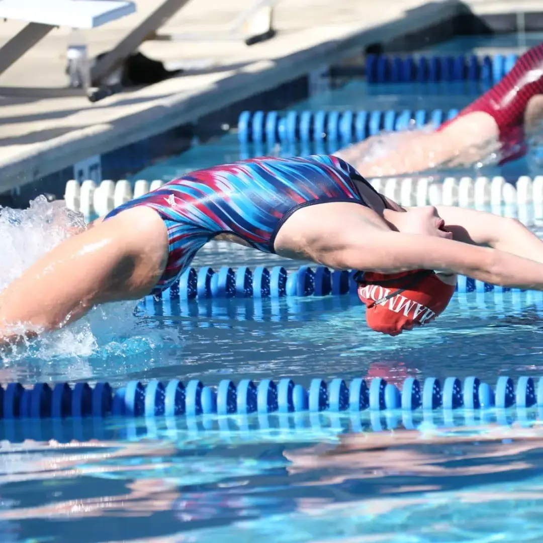 Girl Student Performing in Swim team