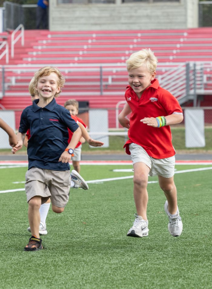 lower school students running