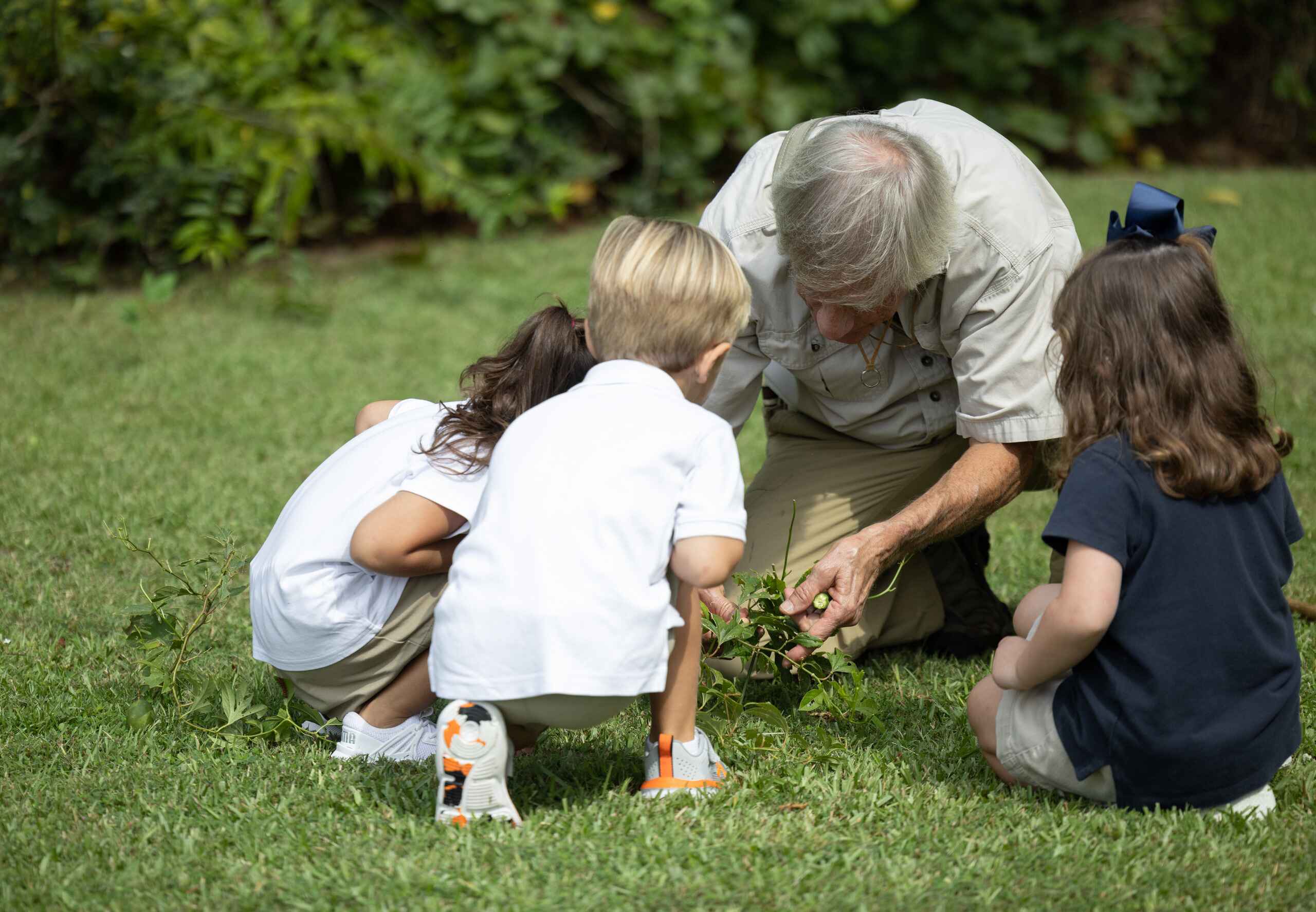 Teacher with Students in Field